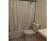 Cozy bathroom with standard bathtub, toilet, and vanity at 233 N Hudson St, Orlando, FL 32835