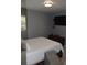 Relaxing bedroom with warm grey walls, soft lighting, and modern furnishings, creating a serene atmosphere at 233 N Hudson St, Orlando, FL 32835
