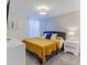 Stylish bedroom features modern accents and a decorative geometric patterned wallpaper at 2850 Bookmark Dr, Kissimmee, FL 34746