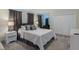 Comfortable bedroom with a king-size bed, bedside tables with lamps, and closet at 2850 Bookmark Dr, Kissimmee, FL 34746