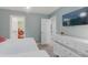 Bright bedroom with stylish decor, dresser, TV and twin beds at 2850 Bookmark Dr, Kissimmee, FL 34746