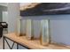 Staged decor on a wooden table complements the room's interior, enhancing the aesthetic appeal and inviting atmosphere at 2850 Bookmark Dr, Kissimmee, FL 34746