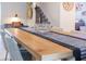 Dining table with stylish decor and dining room chairs provides an inviting space for meals and gatherings at 2850 Bookmark Dr, Kissimmee, FL 34746