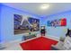 Vibrant game room with a Mario Kart theme, arcade games, and seating for hours of fun at 2850 Bookmark Dr, Kissimmee, FL 34746