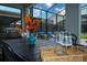 Cozy outdoor dining area with a view of the pool, perfect for enjoying meals in a serene setting at 2850 Bookmark Dr, Kissimmee, FL 34746