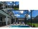 Stunning screened-in pool and hot tub area, perfect for outdoor enjoyment and relaxation at 2850 Bookmark Dr, Kissimmee, FL 34746