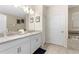 Bright bathroom with double sinks, modern fixtures, and ample counter space at 2907 Fable St, Kissimmee, FL 34746