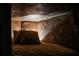 Comfortable cave themed bunkbed with furry pillows in a cozy and dimly lit bedroom with unique rock-like walls at 2907 Fable St, Kissimmee, FL 34746