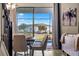 Bright dining area with a pool view and contemporary furnishings at 2907 Fable St, Kissimmee, FL 34746