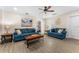 Comfortable living room featuring two sofas, lamps, and a coffee table at 2907 Fable St, Kissimmee, FL 34746