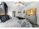 Well-appointed bedroom featuring a TV, dresser, and stylish decor elements for a relaxing space at 2907 Fable St, Kissimmee, FL 34746