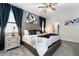 Serene bedroom with plush bedding, ambient lighting, and a soothing color scheme at 2907 Fable St, Kissimmee, FL 34746