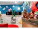 Charming playroom featuring a custom-built bar and toy figures, providing a delightful area for children to play at 2907 Fable St, Kissimmee, FL 34746