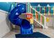 Toy Story themed playroom with slide, stairs, and colorful accents, creating a fun and imaginative space at 2907 Fable St, Kissimmee, FL 34746
