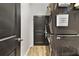 Convenient laundry room equipped with stackable washer and dryer units at 311 Eaglecrest Dr, Haines City, FL 33844