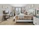 Bedroom featuring carpeted floors, neutral-colored walls, a window, and coordinated decor and furnishings at 311 Eaglecrest Dr, Haines City, FL 33844