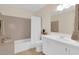 Cozy bathroom with white vanity, tub, and shower at 3153 Greenwood St # Winter Spr, Winter Park, FL 32792