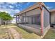 Exterior of covered patio that transitions into the backyard and yard at 3153 Greenwood St # Winter Spr, Winter Park, FL 32792