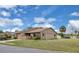 A cozy single-story home sits on a corner lot featuring a neatly manicured lawn and side yard at 3153 Greenwood St # Winter Spr, Winter Park, FL 32792