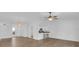 Spacious living area featuring new flooring, modern ceiling fans, and an open layout, perfect for entertaining at 3153 Greenwood St # Winter Spr, Winter Park, FL 32792