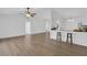 Bright and airy living space with hardwood flooring and views into the kitchen and dining area at 3153 Greenwood St # Winter Spr, Winter Park, FL 32792