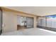 Covered patio that transitions into the kitchen with modern appliances at 3153 Greenwood St # Winter Spr, Winter Park, FL 32792