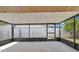 Enclosed patio with screen windows and views of the fenced backyard at 3153 Greenwood St # Winter Spr, Winter Park, FL 32792