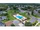 Aerial view of community pool surrounded by palm trees at 3153 Greenwood St # Winter Spr, Winter Park, FL 32792