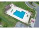 Aerial view of a community pool with ample lounge seating at 3153 Greenwood St # Winter Spr, Winter Park, FL 32792
