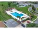 Aerial view of community pool with lounge seating and parking at 3153 Greenwood St # Winter Spr, Winter Park, FL 32792