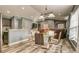 Open-concept layout showcasing a dining area next to the kitchen with a breakfast bar at 316 Bennett St, Auburndale, FL 33823