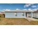 Charming home with a well-maintained lawn and covered entryway at 316 Bennett St, Auburndale, FL 33823