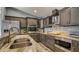 Well-appointed kitchen featuring stainless steel appliances, granite countertops, and a stylish faucet at 316 Bennett St, Auburndale, FL 33823
