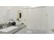 The stylish bathroom boasts modern fixtures and a shower/tub combination at 326 Puma Loop, Groveland, FL 34736