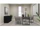 Cozy home office featuring modern furniture, neutral tones, and ample natural light creating a productive workspace at 326 Puma Loop, Groveland, FL 34736