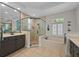 Bathroom with walk-in shower, soaking tub and dual vanities at 3267 Regal Crest Dr, Longwood, FL 32779