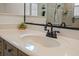 Bathroom vanity features a modern faucet, undermount sink, and stylish accents at 3267 Regal Crest Dr, Longwood, FL 32779