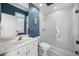 Modern bathroom with white cabinets, a glass enclosed shower, and neutral tiling at 3267 Regal Crest Dr, Longwood, FL 32779