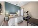Comfortable bedroom featuring an exercise machine, natural light, and neutral decor at 3267 Regal Crest Dr, Longwood, FL 32779