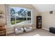 Bonus room featuring natural light with a large window, neutral walls, and hardwood floors at 3267 Regal Crest Dr, Longwood, FL 32779