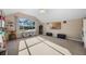 Bonus room with large windows, natural light, and space for entertainment at 3267 Regal Crest Dr, Longwood, FL 32779