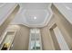 Detailed tray ceiling with recessed lighting and a bright window at 3267 Regal Crest Dr, Longwood, FL 32779