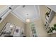 Detailed tray ceiling with pendant lighting and a bright window at 3267 Regal Crest Dr, Longwood, FL 32779