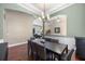 Dining room with contemporary chandelier and views into the living spaces beyond at 3267 Regal Crest Dr, Longwood, FL 32779