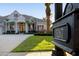 Lovely home exterior featuring lush landscaping, mature trees, and an inviting entrance at 3267 Regal Crest Dr, Longwood, FL 32779