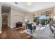 Spacious living room featuring hardwood floors, comfortable seating, and expansive windows at 3267 Regal Crest Dr, Longwood, FL 32779