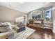 Bright living room with stone fireplace and open concept design at 3267 Regal Crest Dr, Longwood, FL 32779