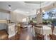 Open-concept living space with fireplace, breakfast nook, and granite counters at 3267 Regal Crest Dr, Longwood, FL 32779