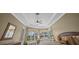 Main bedroom with a seating area, bright windows and natural light at 3267 Regal Crest Dr, Longwood, FL 32779