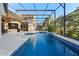 Inviting swimming pool within a screened lanai offering a clear view of the home's exterior at 3267 Regal Crest Dr, Longwood, FL 32779